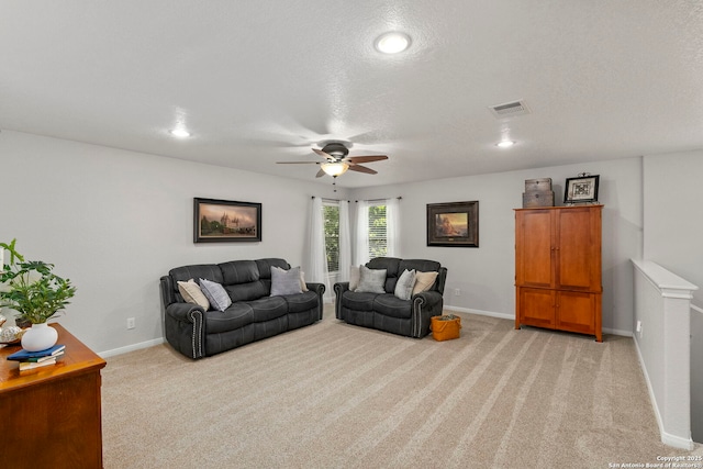116 Cold Riv, Boerne, TX 78006 - living room with light colored carpet, ceiling fan, recessed lighting, and a textured ceiling