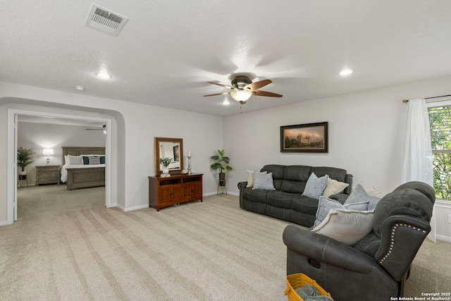 116 Cold Riv, Boerne, TX 78006 - carpeted living room featuring a ceiling fan and recessed lighting