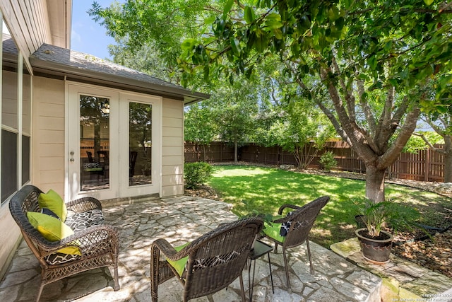 116 Cold Riv, Boerne, TX 78006 - fenced backyard with french doors and a patio