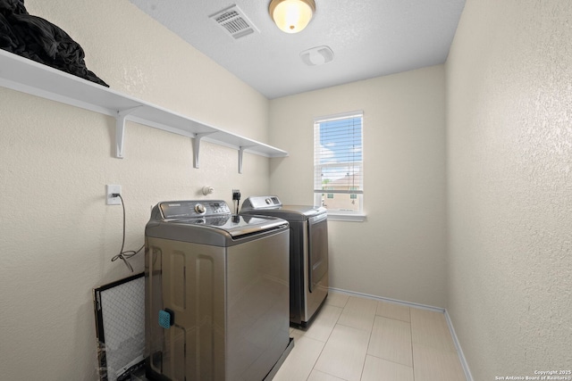 220 Hinge, Cibolo, TX 78108 - washroom with washing machine and clothes dryer and baseboards