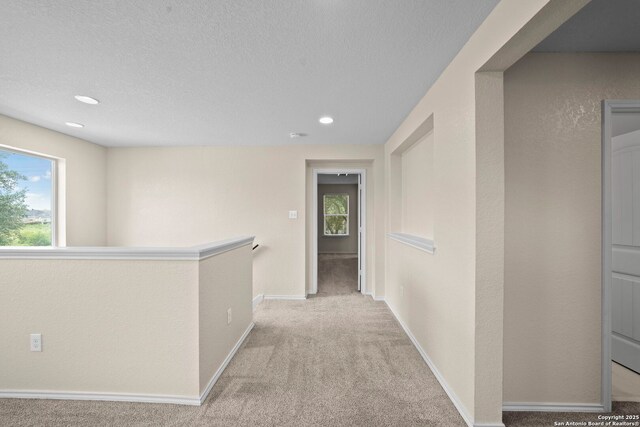 220 Hinge, Cibolo, TX 78108 - hall with carpet, recessed lighting, and a textured ceiling