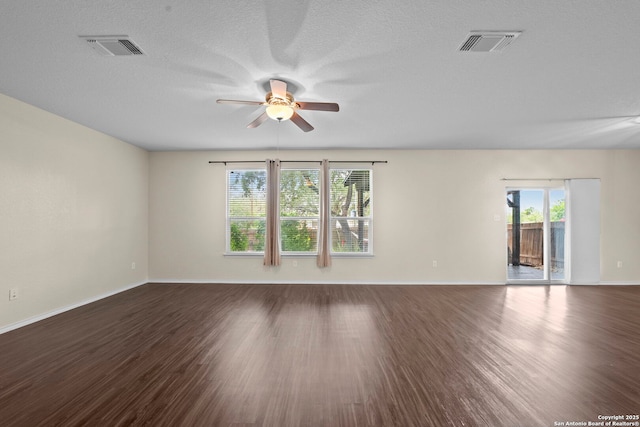 220 Hinge, Cibolo, TX 78108 - empty room with a ceiling fan, healthy amount of natural light, wood finished floors, and a textured ceiling