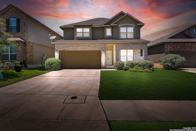 8919 Ladbroke, Converse, TX 78109 - traditional-style house with stone siding, an attached garage, a yard, driveway, and stucco siding