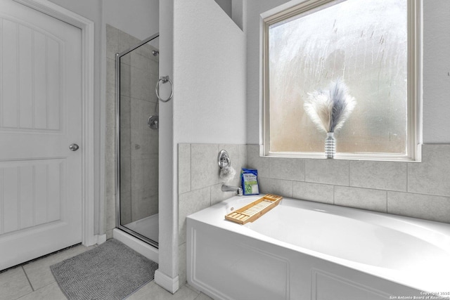 8919 Ladbroke, Converse, TX 78109 - full bath featuring a stall shower, a bath, and tile patterned floors