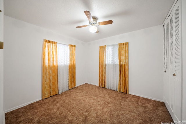 7022 Centergrove Dr, San Antonio, TX 78227 - unfurnished bedroom with multiple windows, a closet, and carpet