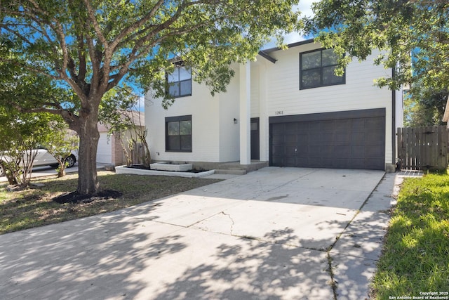 12811 Hunting Hawk, San Antonio, TX 78249 - view of front of house with a garage and driveway