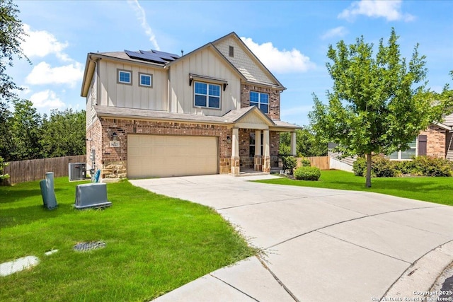 16327 Amistad Pass, San Antonio, TX 78247 - craftsman house with board and batten siding, solar panels, concrete driveway, an attached garage, and covered porch