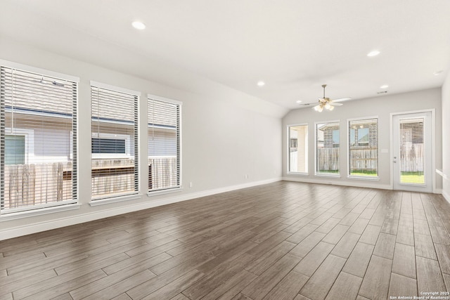 636 Vireos, New Braunfels, TX 78132 - unfurnished living room with wood finished floors, a ceiling fan, and recessed lighting