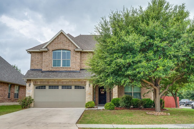 929 Resaca, Cibolo, TX 78108 - traditional-style house featuring an attached garage, concrete driveway, a front lawn, and a shingled roof