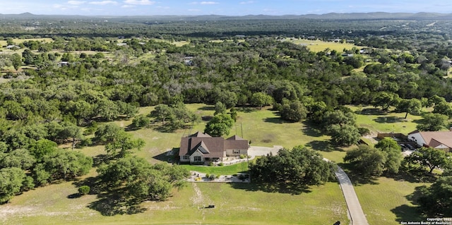 744 E Rio Azule, Pipe Creek, TX 78063 - view from above of property featuring a forest
