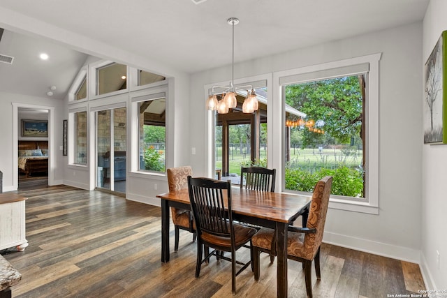 744 E Rio Azule, Pipe Creek, TX 78063 - dining space with plenty of natural light, dark wood finished floors, and vaulted ceiling