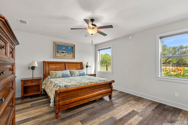 744 E Rio Azule, Pipe Creek, TX 78063 - bedroom with dark wood-style floors and ceiling fan