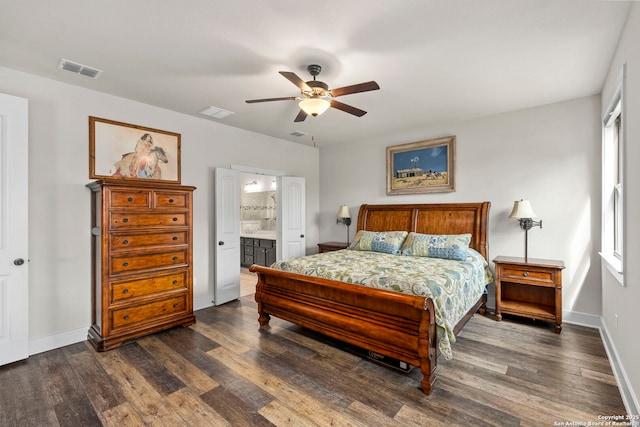 744 E Rio Azule, Pipe Creek, TX 78063 - bedroom featuring dark wood finished floors, a ceiling fan, and ensuite bathroom