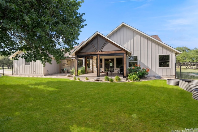 744 E Rio Azule, Pipe Creek, TX 78063 - back of property featuring board and batten siding and a patio area
