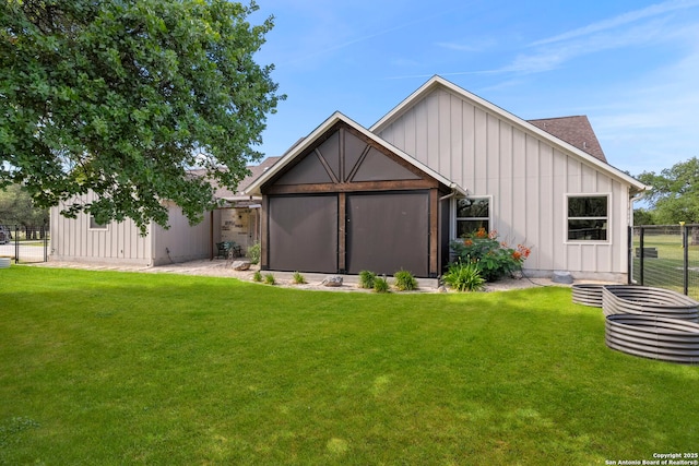 744 E Rio Azule, Pipe Creek, TX 78063 - rear view of house featuring board and batten siding and roof with shingles