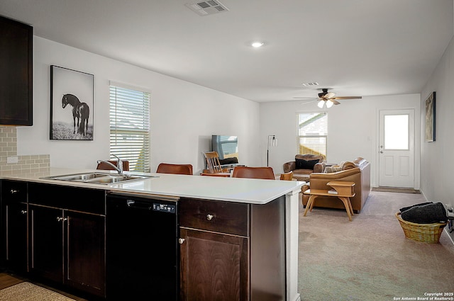 175 Amber, Maxwell, TX 78656 - kitchen featuring dishwasher, a peninsula, light countertops, and ceiling fan