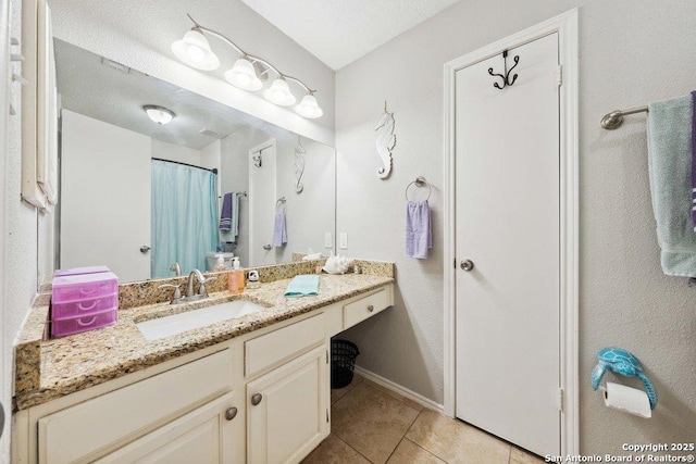 6411 Gray Rdg, San Antonio, TX 78233 - bathroom with vanity and tile patterned floors