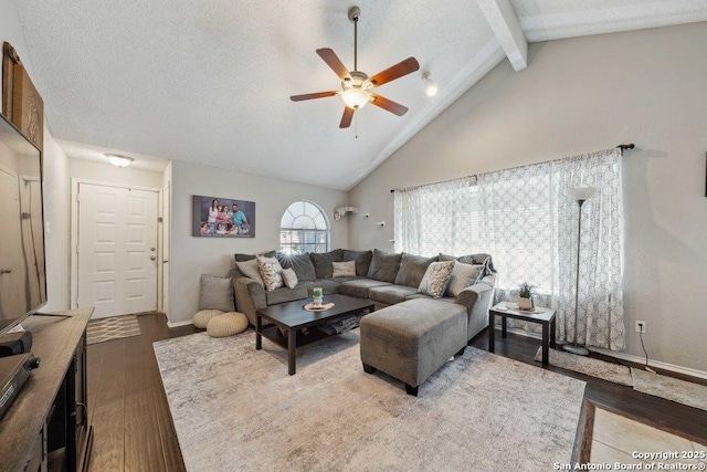 6411 Gray Rdg, San Antonio, TX 78233 - living area with ceiling fan, dark wood finished floors, beamed ceiling, and high vaulted ceiling