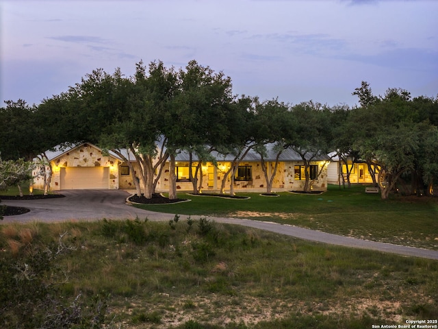 29720 Twin Creeks, Bulverde, TX 78163 - view of front facade with asphalt driveway, a front yard, and an attached garage