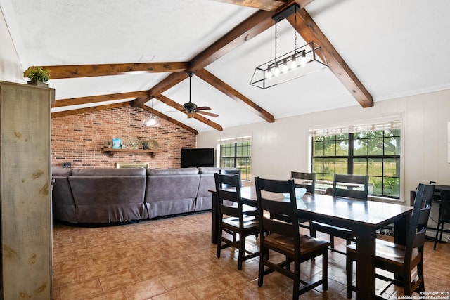 1373 County Road 373, Uvalde, TX 78801 - dining space featuring brick wall and ceiling fan