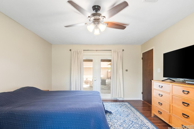 1373 County Road 373, Uvalde, TX 78801 - bedroom with dark wood finished floors, access to outside, french doors, and ceiling fan