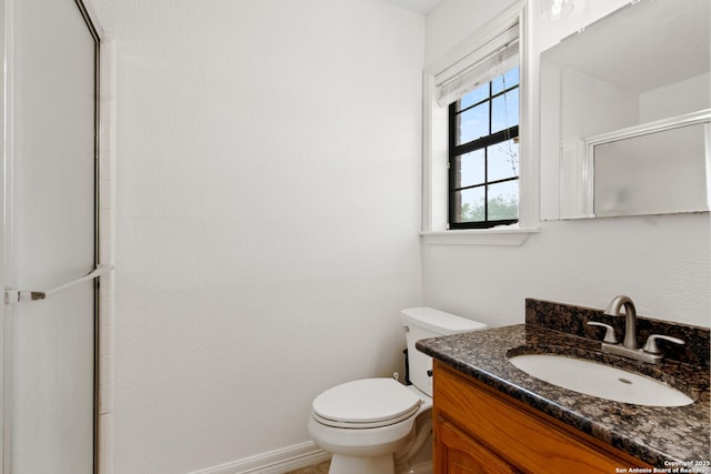 1373 County Road 373, Uvalde, TX 78801 - bathroom featuring a shower with shower door and vanity