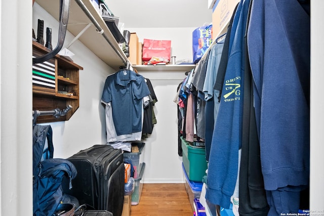 1373 County Road 373, Uvalde, TX 78801 - walk in closet with wood finished floors