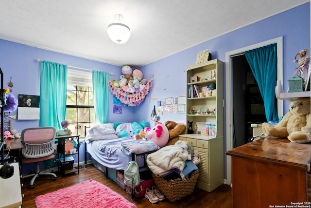 1373 County Road 373, Uvalde, TX 78801 - bedroom with wood finished floors