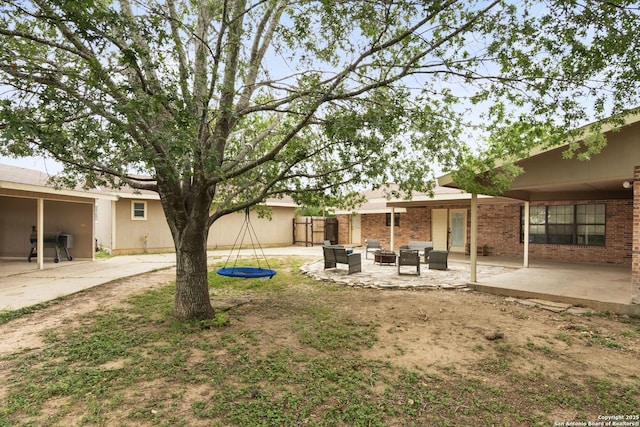 1373 County Road 373, Uvalde, TX 78801 - view of yard featuring outdoor lounge area and a patio area