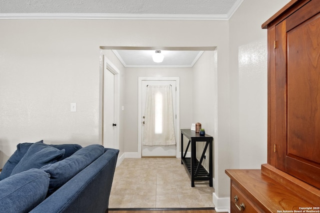 1373 County Road 373, Uvalde, TX 78801 - foyer with ornamental molding and light tile patterned flooring