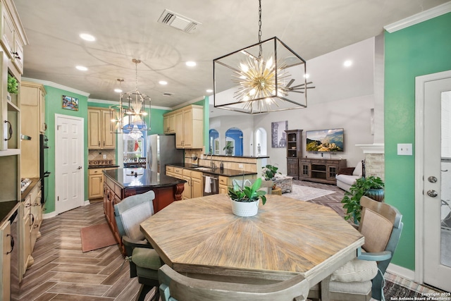 2326 Blackoak Bnd, San Antonio, TX 78248 - dining room featuring a chandelier, ornamental molding, recessed lighting, and a fireplace