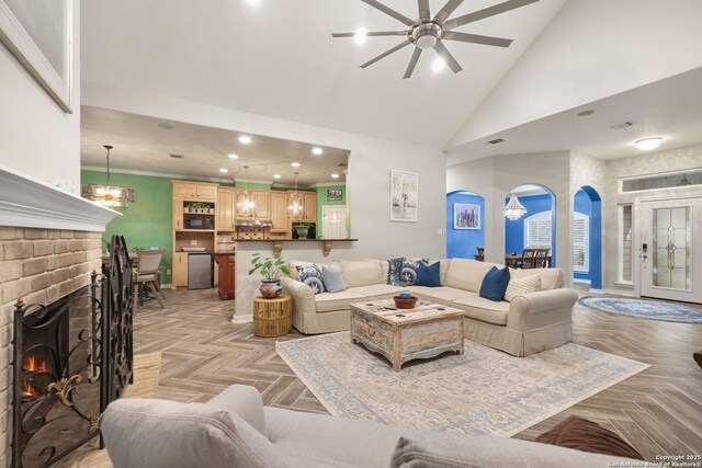 2326 Blackoak Bnd, San Antonio, TX 78248 - living area with ceiling fan, recessed lighting, high vaulted ceiling, a chandelier, and a fireplace
