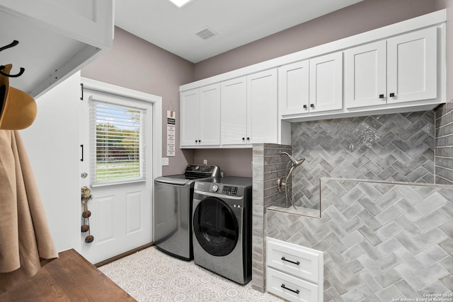 608 Kendall Pkwy, Boerne, TX 78015 - laundry room featuring washing machine and dryer and cabinet space