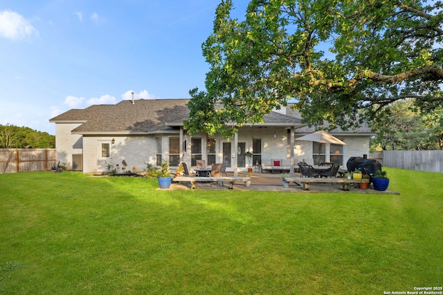 608 Kendall Pkwy, Boerne, TX 78015 - back of house with a fenced backyard, a patio area, and roof with shingles