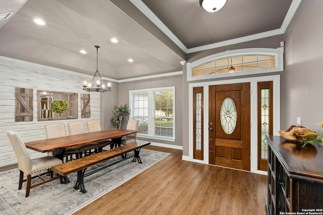 608 Kendall Pkwy, Boerne, TX 78015 - foyer with crown molding, a chandelier, wood finished floors, and recessed lighting