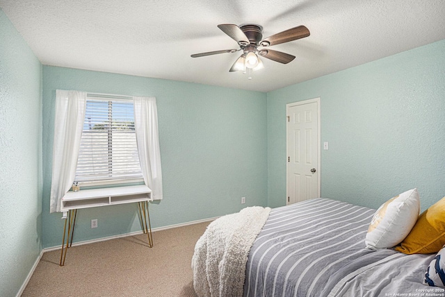 13812 Riverbank Pass, Helotes, TX 78023 - bedroom featuring carpet, ceiling fan, and a textured wall