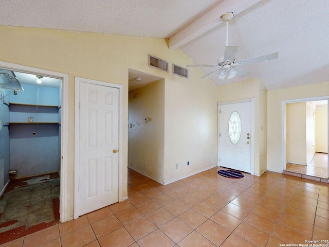 3415 Twining, San Antonio, TX 78211 - foyer with light tile patterned floors, ceiling fan, and a textured ceiling