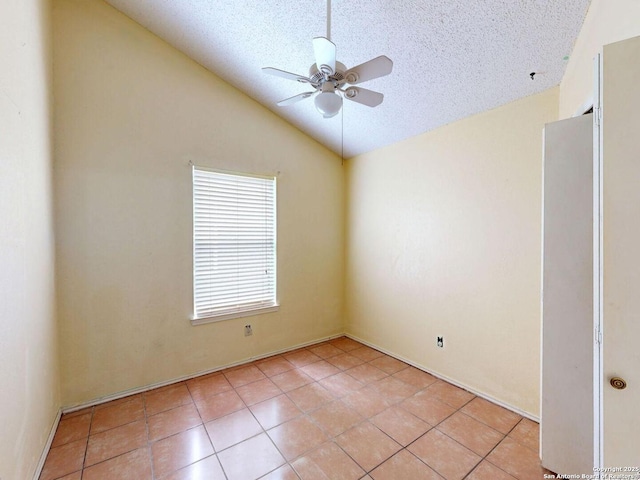 3415 Twining, San Antonio, TX 78211 - unfurnished room featuring a ceiling fan, lofted ceiling, a textured ceiling, and light tile patterned floors