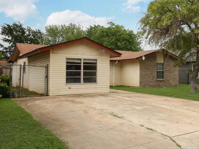 3415 Twining, San Antonio, TX 78211 - view of front of property with a gate and concrete driveway