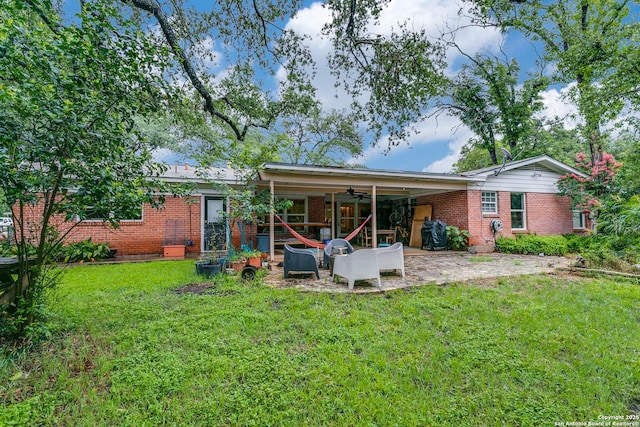 1332 Grey Oak Dr, San Antonio, TX 78213 - rear view of property featuring brick siding, a ceiling fan, a patio, and a lawn