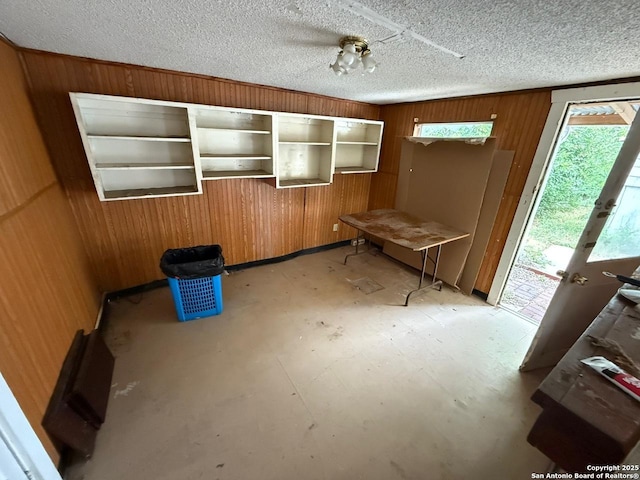 215 W Academy, San Antonio, TX 78226 - misc room featuring wood walls and a textured ceiling