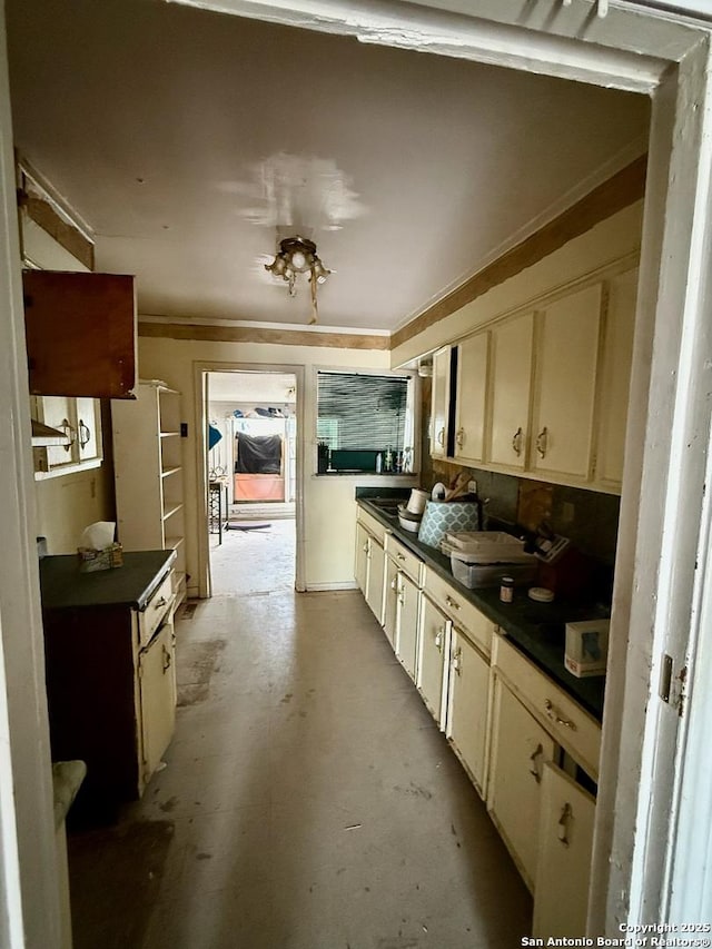 215 W Academy, San Antonio, TX 78226 - kitchen featuring concrete floors and dark countertops