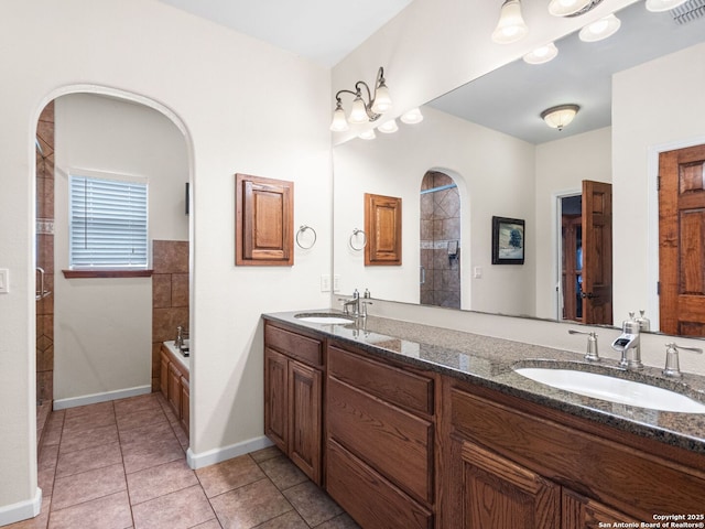 1131 Meadow Stream Rd, Spring Branch, TX 78070 - bathroom with double vanity, a bath, tile patterned floors, and tiled shower