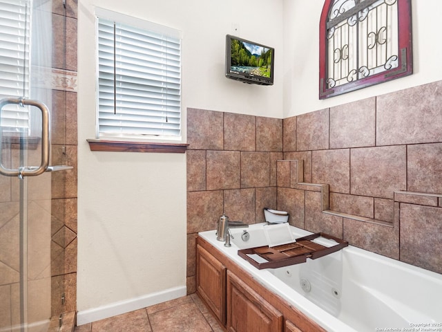 1131 Meadow Stream Rd, Spring Branch, TX 78070 - bathroom with a jetted tub, a stall shower, and tile patterned flooring