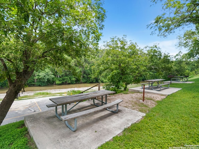 1131 Meadow Stream Rd, Spring Branch, TX 78070 - surrounding community featuring a yard and a patio