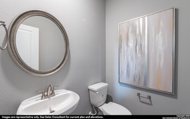14704 Lower Holw, San Antonio, TX 78252 - bathroom with a sink and toilet