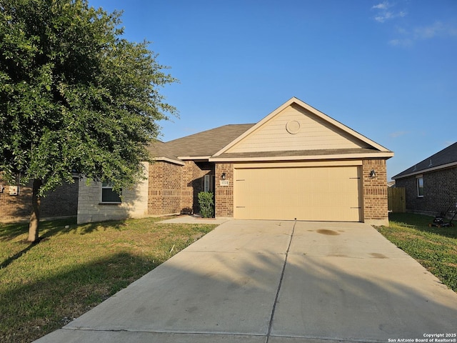 6723 Luckey Pond, San Antonio, TX 78252 - ranch-style home with brick siding, a front yard, driveway, and an attached garage