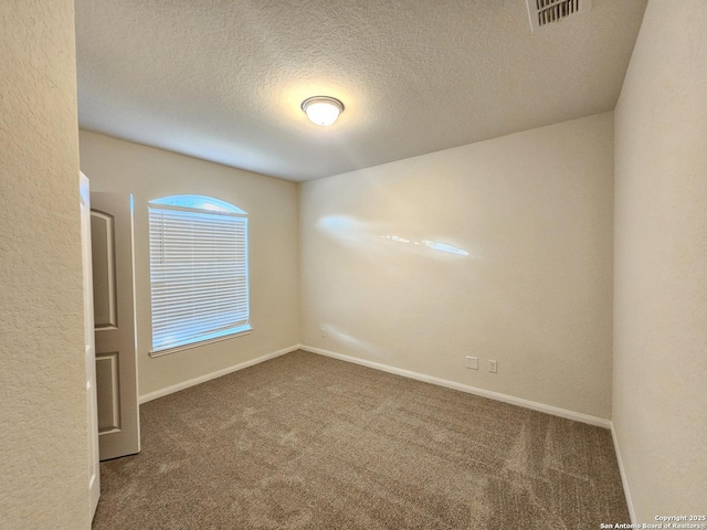 6723 Luckey Pond, San Antonio, TX 78252 - carpeted spare room featuring a textured ceiling and baseboards