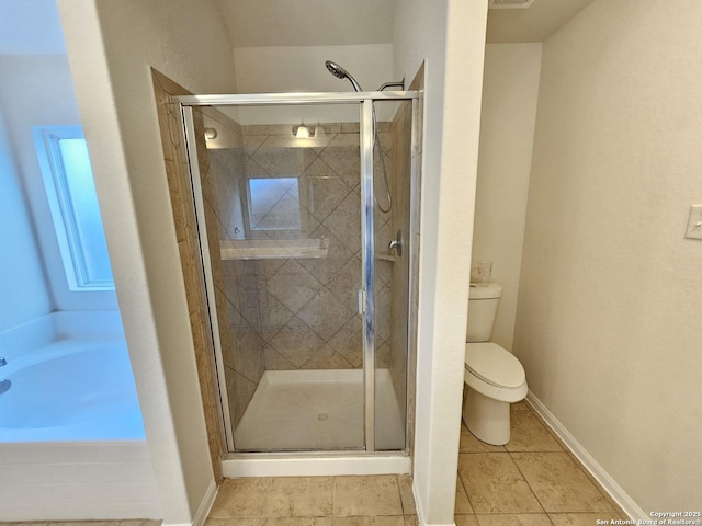 6723 Luckey Pond, San Antonio, TX 78252 - full bathroom featuring a shower stall, tile patterned flooring, and a bath