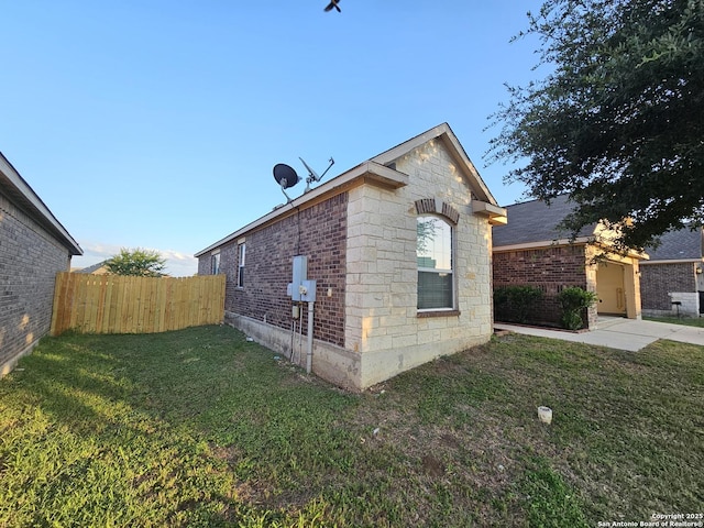 6723 Luckey Pond, San Antonio, TX 78252 - view of side of home featuring stone siding and brick siding